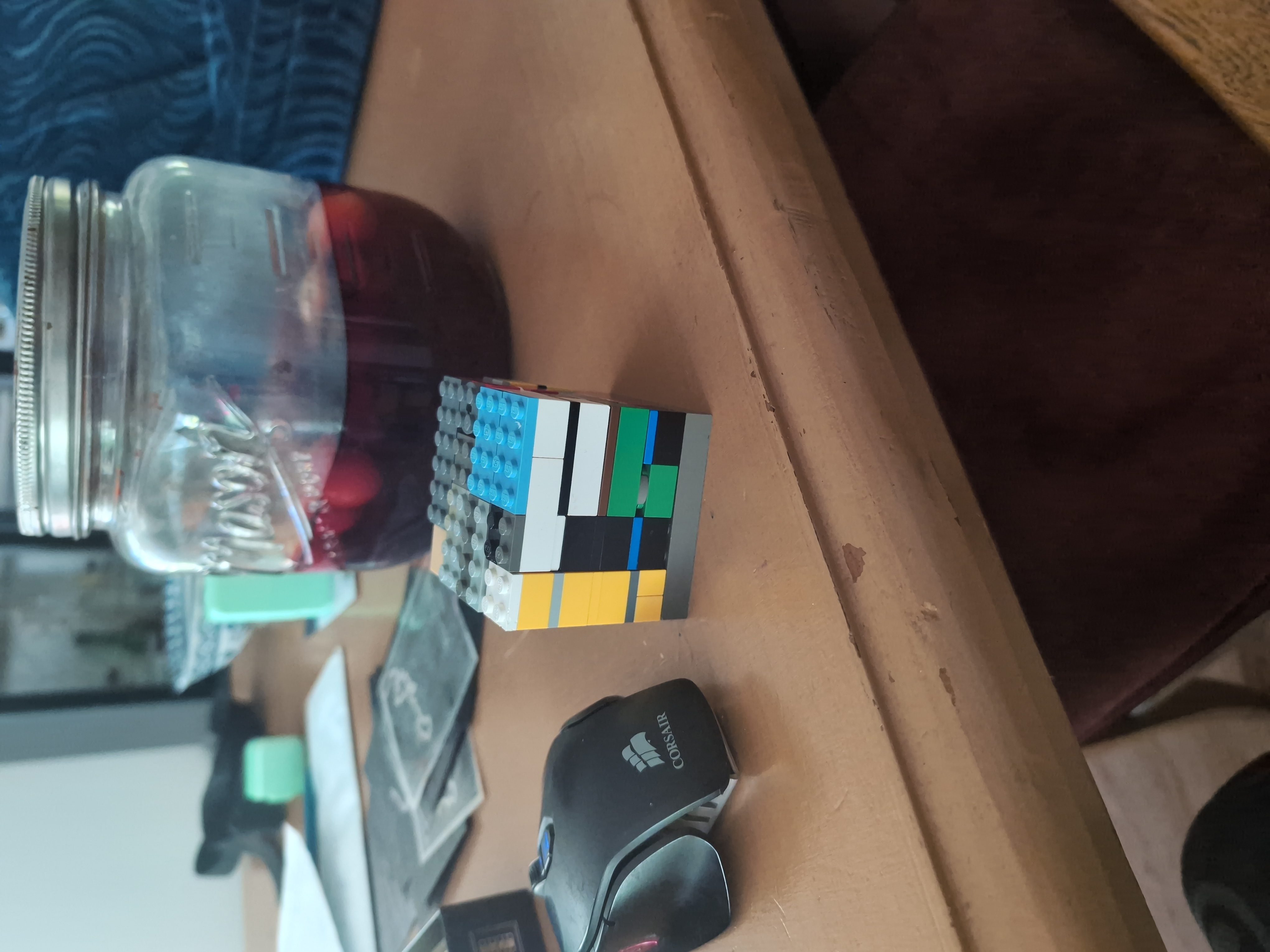 A cube made of lego bricks assembled into pieces