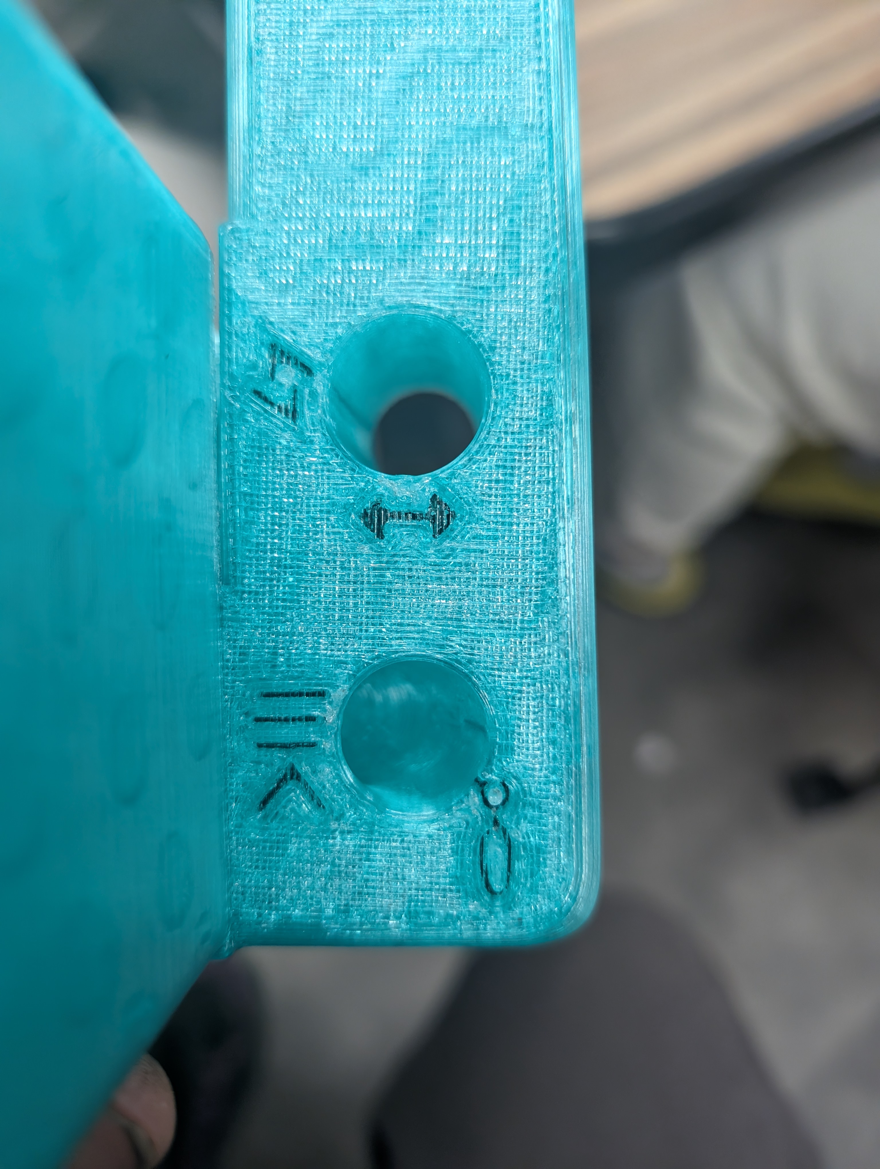 Runes on a teal piece