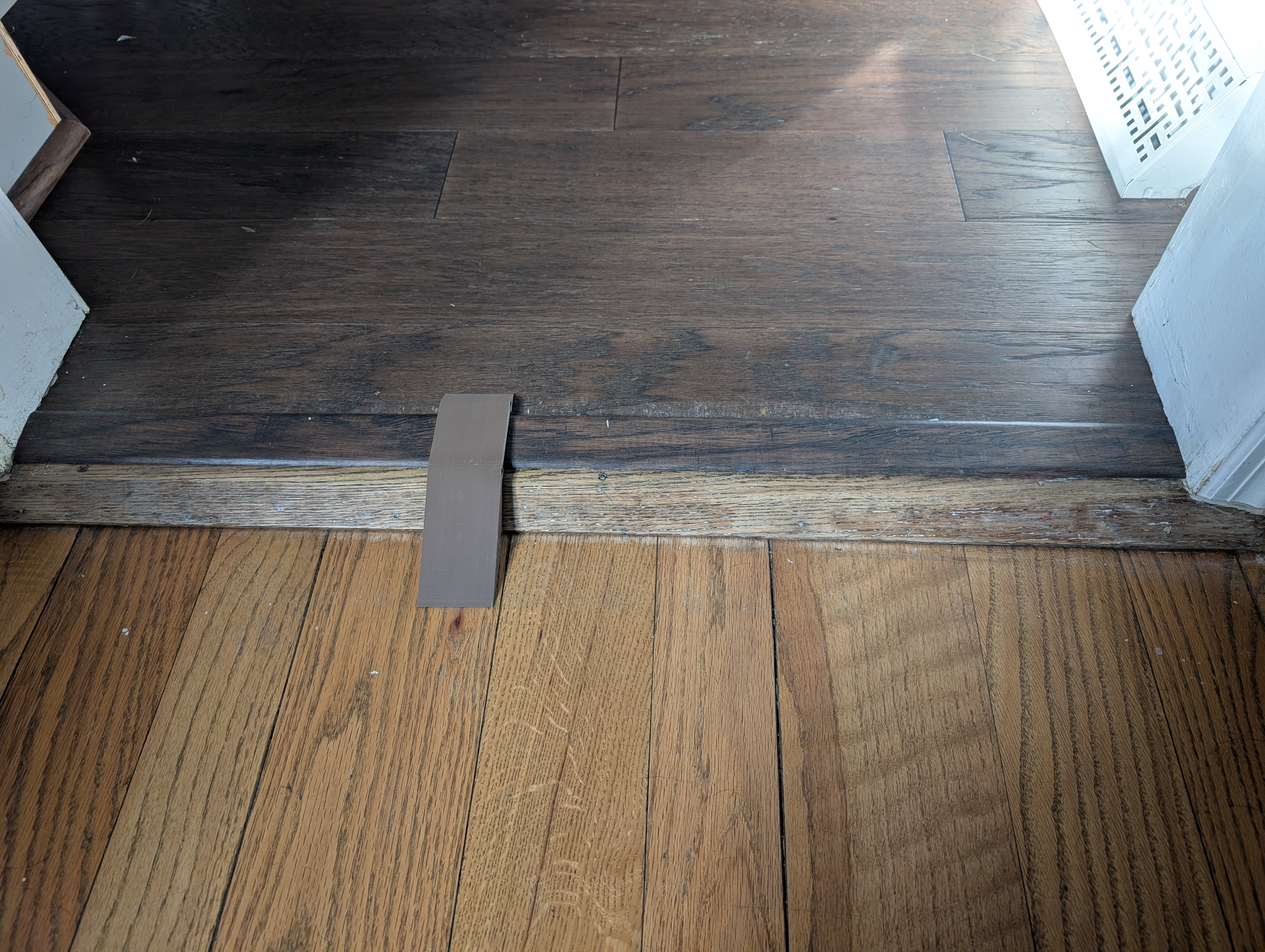 A doorway with a small lip