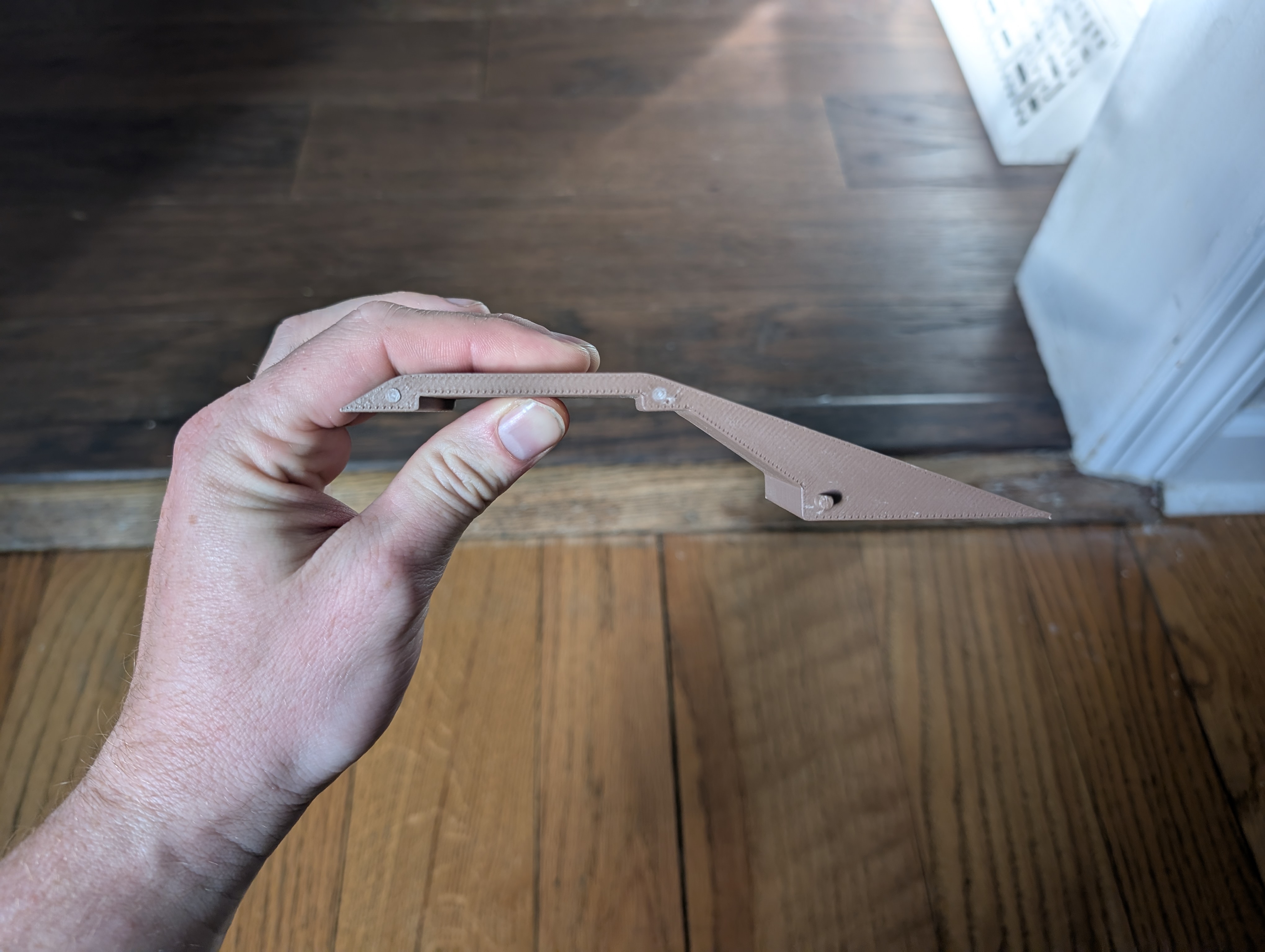 A 3d printed, brown ramp